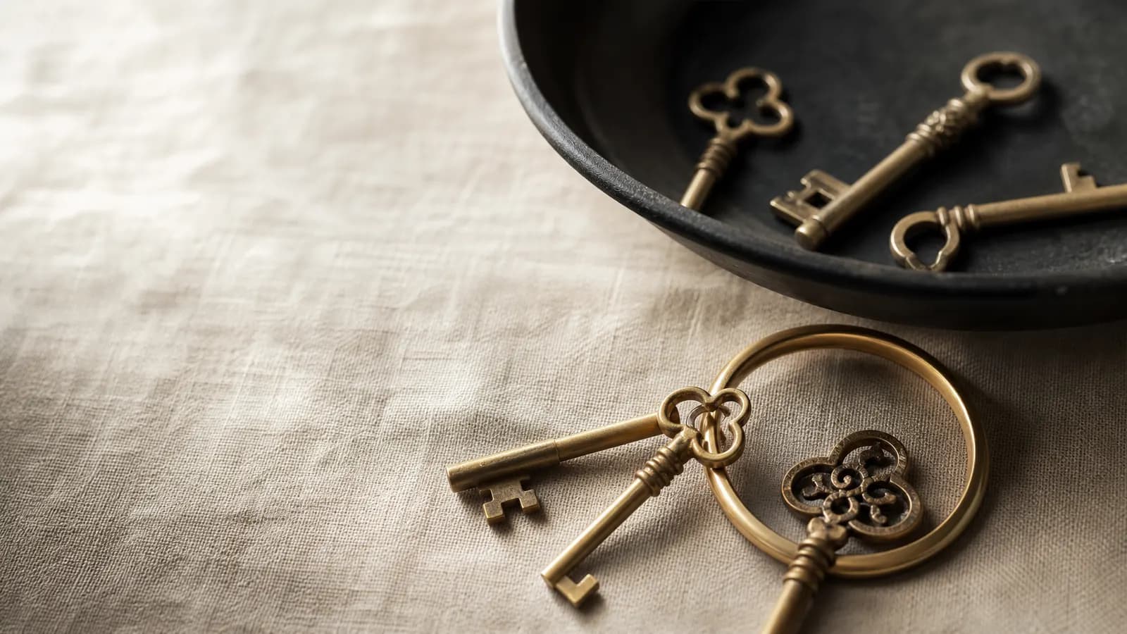 Assorted brass keys gathered onto one ring